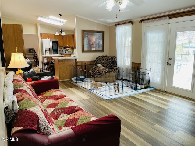 800 Buffalo Ridge Rd, Big Stone Gap, VA 24219 - living room with lofted ceiling, ornamental molding, and light hardwood / wood-style floors