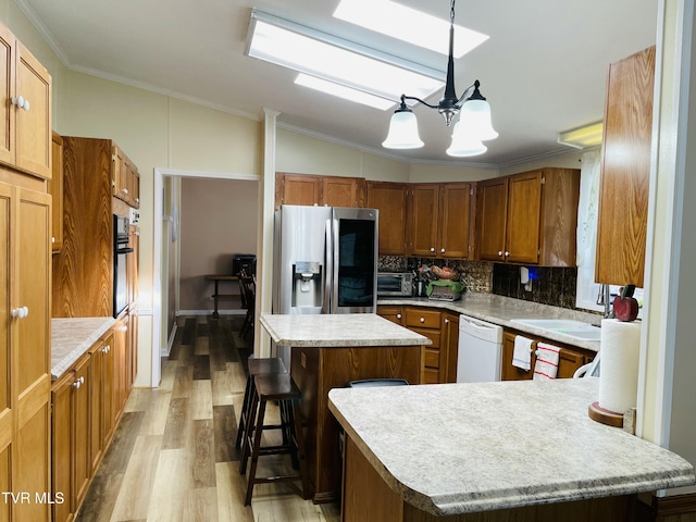 800 Buffalo Ridge Rd, Big Stone Gap, VA 24219 - kitchen with sink, stainless steel fridge with ice dispenser, hanging light fixtures, dishwasher, and a kitchen island