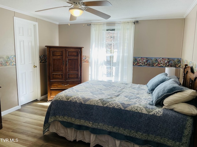 800 Buffalo Ridge Rd, Big Stone Gap, VA 24219 - bedroom featuring ornamental molding, light hardwood / wood-style floors, and ceiling fan