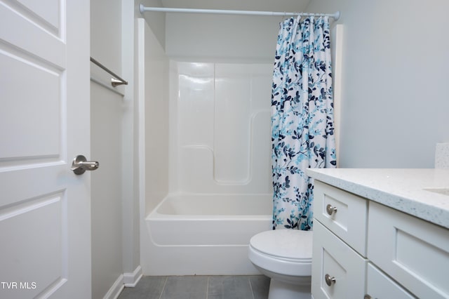 full bathroom featuring vanity, shower / bath combination with curtain, tile patterned floors, and toilet