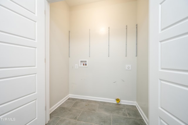 clothes washing area featuring hookup for a washing machine