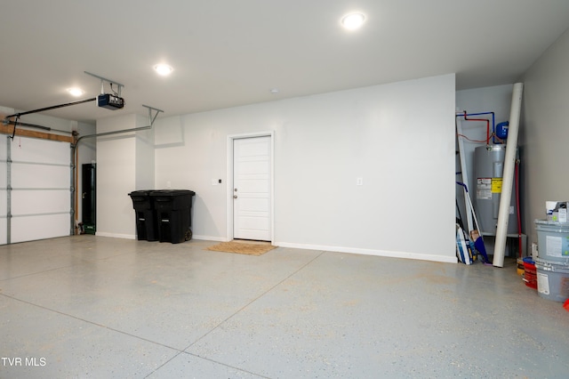 garage featuring a garage door opener and electric water heater