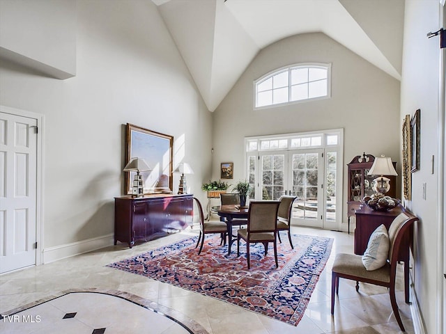 400 Bancroft Chapel Rd, Kingsport, TN 37660 - tiled dining space featuring high vaulted ceiling and baseboards