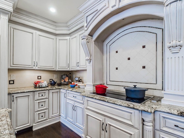 400 Bancroft Chapel Rd, Kingsport, TN 37660 - kitchen with black electric cooktop, white cabinets, dark wood-style floors, and light stone counters