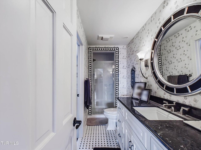 400 Bancroft Chapel Rd, Kingsport, TN 37660 - bathroom featuring wallpapered walls, a stall shower, toilet, vanity, and tile patterned floors