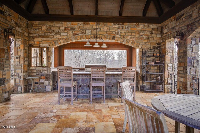 400 Bancroft Chapel Rd, Kingsport, TN 37660 - dining room with stone tile floors and wooden ceiling