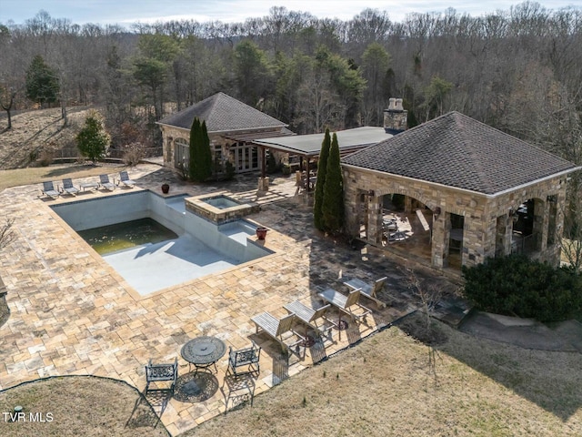 400 Bancroft Chapel Rd, Kingsport, TN 37660 - swimming pool with a patio area, a forest view, and an in-ground hot tub