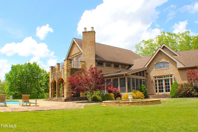 400 Bancroft Chapel Rd, Kingsport, TN 37660 - rear view of property featuring a sunroom, a lawn, a chimney, and an outdoor pool