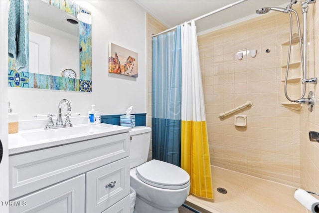 bathroom with vanity, a shower with shower curtain, and toilet