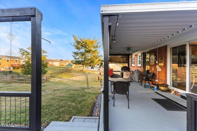 view of patio / terrace featuring ceiling fan