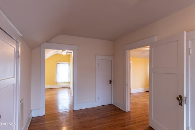 interior space with wood-type flooring and lofted ceiling