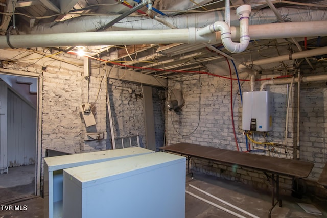 basement with fridge and water heater