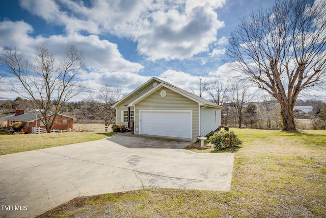 garage featuring driveway