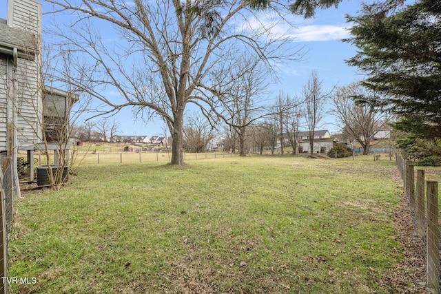 view of yard with central AC unit