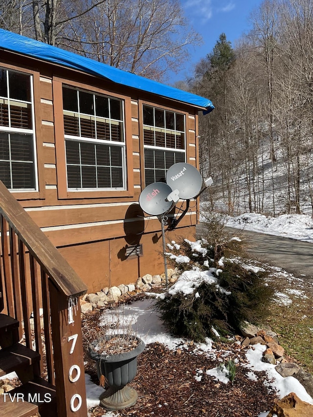 view of snow covered deck