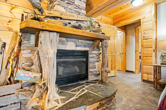 room details featuring a fireplace and wooden ceiling