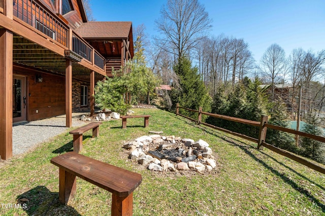 view of yard featuring a fire pit