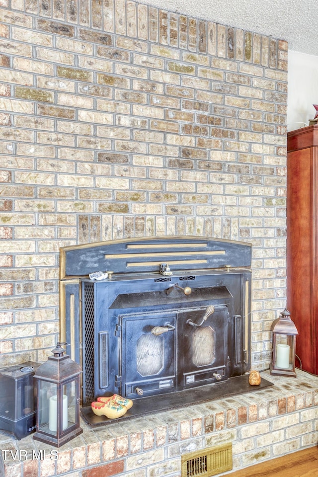 details featuring wood-type flooring