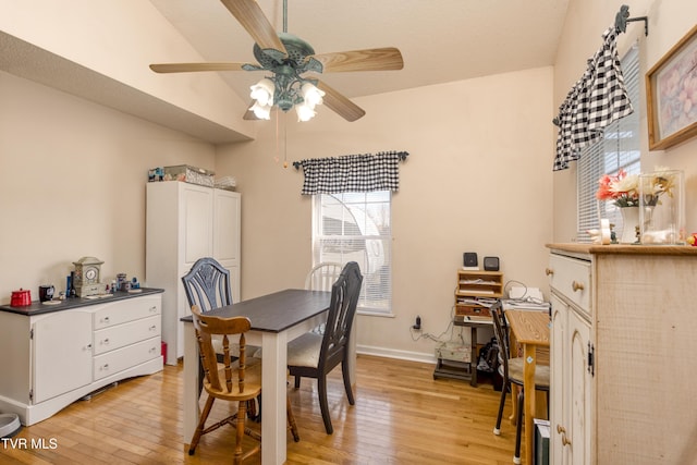 dining area featuring ceiling fan and light hardwood / wood-style floors