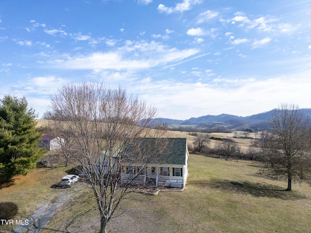 exterior space featuring a mountain view and a rural view