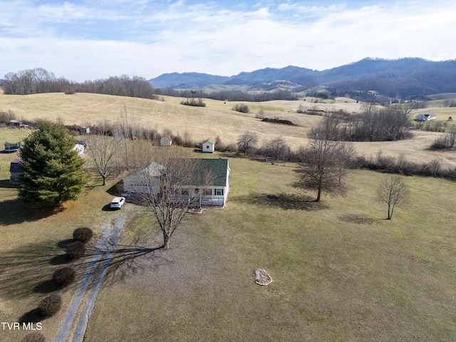 exterior space with a mountain view and a rural view