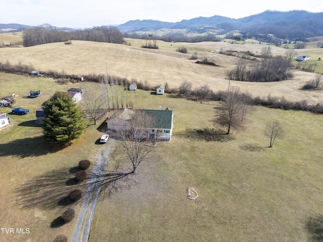 birds eye view of property featuring a rural view and a mountain view