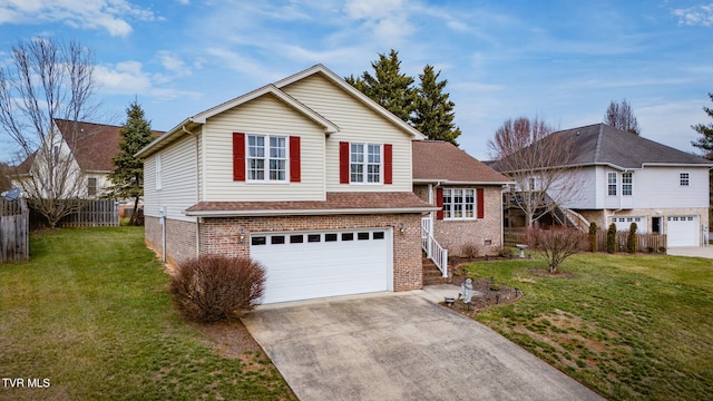 view of front of home with a front lawn and a garage