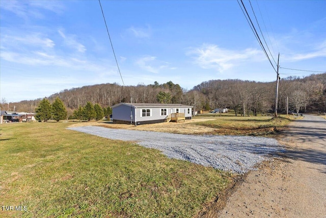 view of front of property with a front lawn