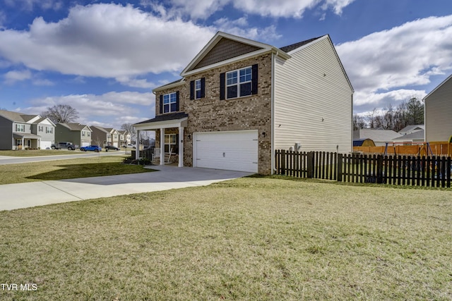 view of front of home featuring a front lawn and a garage