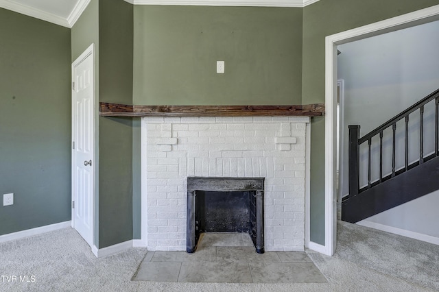 interior details with ornamental molding, carpet floors, and a fireplace