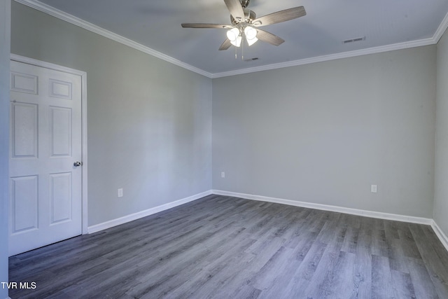 spare room with ceiling fan, ornamental molding, and hardwood / wood-style floors