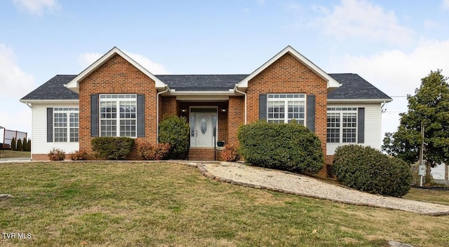 view of front of house with a front lawn