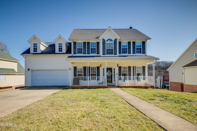 colonial house featuring a garage, covered porch, and a front lawn