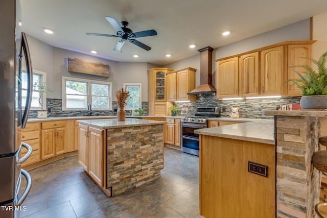 kitchen featuring light brown cabinetry, backsplash, a center island, stainless steel appliances, and custom range hood