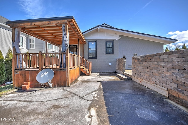 rear view of house with a patio area