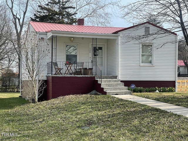 120 Trigg St, Abingdon, VA 24210 - view of front facade with metal roof, a chimney, a front lawn, and a porch