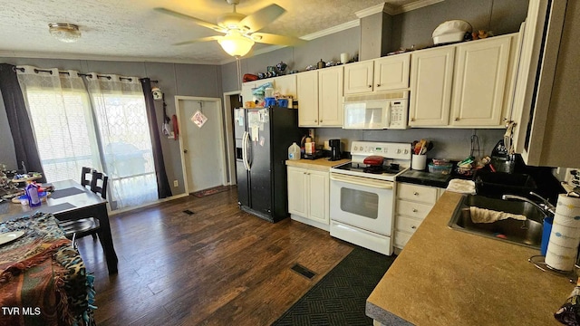 kitchen featuring dark hardwood / wood-style floors, sink, ornamental molding, white appliances, and a textured ceiling