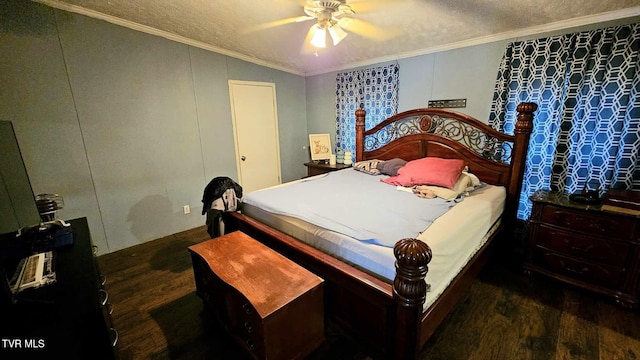 bedroom with dark hardwood / wood-style flooring, ceiling fan, crown molding, and a textured ceiling