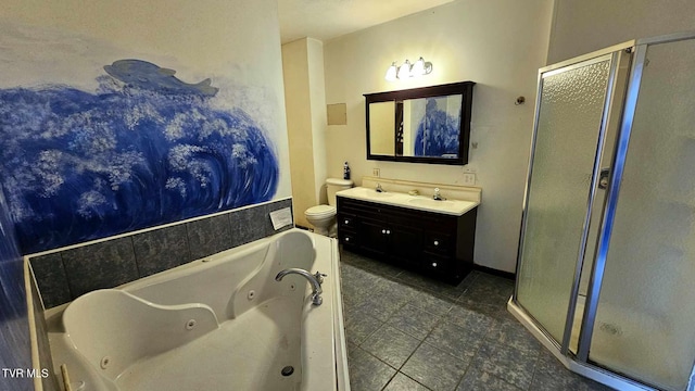 full bathroom featuring vanity, toilet, and separate shower and tub