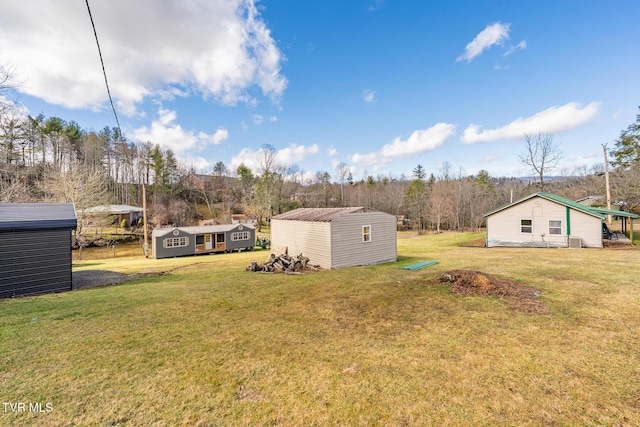 view of yard with a storage shed