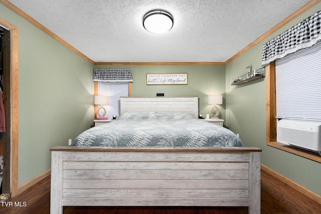 bedroom with crown molding, dark hardwood / wood-style floors, cooling unit, and a textured ceiling