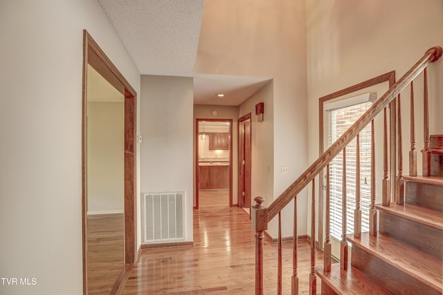 205 Donegal Way Unit 205, Bristol, TN 37620 - interior space with light wood-type flooring, a wealth of natural light, visible vents, and stairs