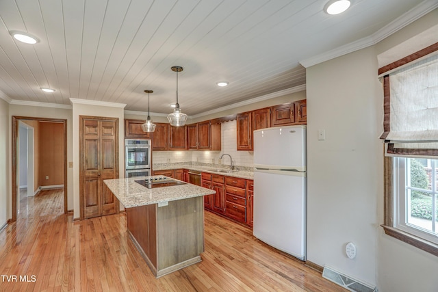 205 Donegal Way Unit 205, Bristol, TN 37620 - kitchen featuring freestanding refrigerator, light wood-style floors, recessed lighting, and a sink