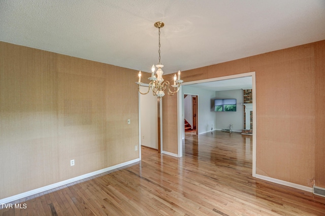 205 Donegal Way Unit 205, Bristol, TN 37620 - unfurnished dining area with stairway, a chandelier, and light wood-style floors