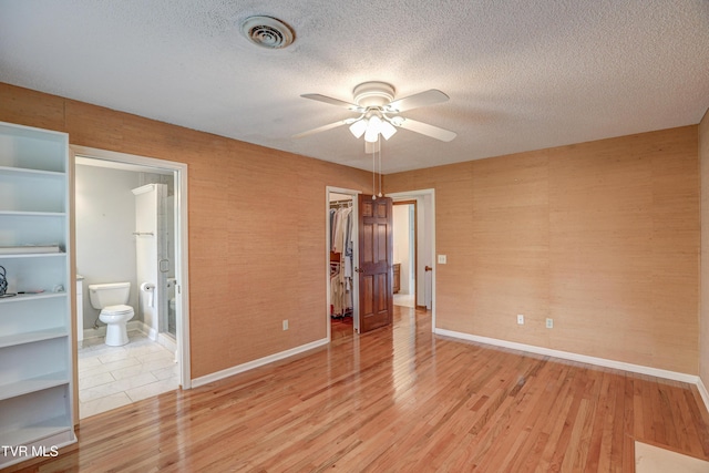 205 Donegal Way Unit 205, Bristol, TN 37620 - unfurnished bedroom featuring a spacious closet, a closet, visible vents, and light wood-style floors
