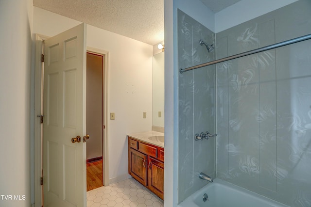 205 Donegal Way Unit 205, Bristol, TN 37620 - bathroom featuring a textured ceiling, tile patterned flooring, vanity, and shower / bathing tub combination