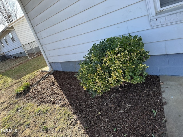 exterior details featuring fence