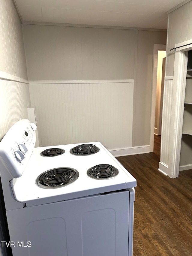 kitchen with white range with electric stovetop and dark wood-type flooring