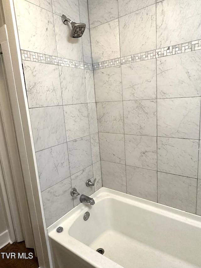 bathroom with shower / bathing tub combination