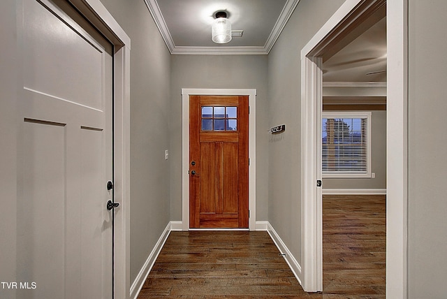 doorway with crown molding and dark wood-type flooring